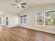 Spacious living room featuring hardwood floors and multiple windows at 2837 Cabaret St, Port Charlotte, FL 33948