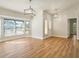 Spacious living room with large windows and hardwood floor at 2837 Cabaret St, Port Charlotte, FL 33948