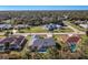Neighborhood view showing the subject home and pool at 2837 Cabaret St, Port Charlotte, FL 33948