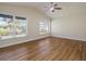Bright and airy living room with hardwood flooring and large windows at 2837 Cabaret St, Port Charlotte, FL 33948