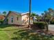 View of home's side yard with lush landscaping at 2837 Cabaret St, Port Charlotte, FL 33948