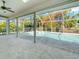 Screened-in pool and patio area with concrete flooring at 2837 Cabaret St, Port Charlotte, FL 33948