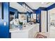 Stylish bathroom with modern lighting, unique vanity, and sophisticated blue color scheme at 218 Brandywine Circle, Englewood, FL 34223