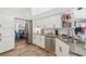 Open kitchen design with stainless steel appliances, granite countertops, and access to dining room at 218 Brandywine Circle, Englewood, FL 34223
