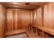 Relaxing wooden sauna with built-in benches at 9397 Midnight Pass Rd # 505, Sarasota, FL 34242