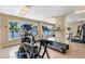 Well-equipped fitness center with cardio and weight machines at 9397 Midnight Pass Rd # 505, Sarasota, FL 34242
