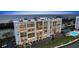 Night aerial view of waterfront building, with ocean and pool views at 9397 Midnight Pass Rd # 505, Sarasota, FL 34242