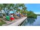 Outdoor kayak storage area with numerous kayaks available for residents at 9397 Midnight Pass Rd # 505, Sarasota, FL 34242