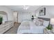 King sized bed, updated furniture, and access to a private balcony at 9397 Midnight Pass Rd # 505, Sarasota, FL 34242