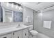 Clean bathroom with a shower/tub combo and updated vanity at 9397 Midnight Pass Rd # 505, Sarasota, FL 34242