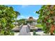 Wooden footbridge leading to a gazebo with water views at 9397 Midnight Pass Rd # 505, Sarasota, FL 34242