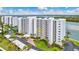 Building exterior showcasing the location and surrounding landscape at 9397 Midnight Pass Rd # 505, Sarasota, FL 34242