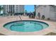 Relaxing hot tub located near the pool and tennis courts at 9397 Midnight Pass Rd # 505, Sarasota, FL 34242