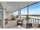 Enjoy breathtaking water views from this screened balcony at 9397 Midnight Pass Rd # 505, Sarasota, FL 34242