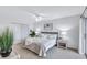 Bright bedroom with a king-size bed and ample closet space at 9397 Midnight Pass Rd # 505, Sarasota, FL 34242