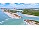 Aerial view of waterfront property, showcasing building location and surrounding landscape at 9397 Midnight Pass Rd # 505, Sarasota, FL 34242