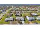 Wide shot of neighborhood with houses, roads, and waterways at 218 Brandywine Circle, Englewood, FL 34223