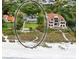 Aerial view of a beachfront property with two houses at 5941 Gulf Of Mexico Dr, Longboat Key, FL 34228