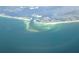 Aerial perspective of a coastal inlet, highlighting a unique waterfront setting at 5941 Gulf Of Mexico Dr, Longboat Key, FL 34228