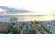 Aerial view of beachfront homes with ocean views and under construction properties at 5941 Gulf Of Mexico Dr, Longboat Key, FL 34228