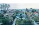 Aerial view of beachfront homes and properties, showcasing a quiet coastal neighborhood at 5941 Gulf Of Mexico Dr, Longboat Key, FL 34228