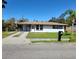 Updated ranch style home with driveway and yard at 2919 Bayshore Gardens Pkwy, Bradenton, FL 34207