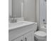 Modern bathroom with a white vanity, stone countertop, and tiled shower and tub at 10442 Morning Mist, Sarasota, FL 34241
