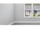 Bright bedroom featuring a large window and neutral walls at 10442 Morning Mist, Sarasota, FL 34241