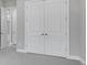 Spacious bedroom with large, paneled doors leading to another room at 10442 Morning Mist, Sarasota, FL 34241