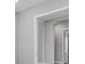 Neutral hallway with bright natural light at 10442 Morning Mist, Sarasota, FL 34241