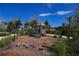 playground with a shaded playhouse and nature-inspired features at 10442 Morning Mist, Sarasota, FL 34241