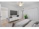 Cozy bedroom with closet and partially visible ensuite bathroom at 1206 Harvard Ave, Bradenton, FL 34207