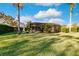View of backyard, screened pool area, and lush landscaping at 22575 Morning Glory Cir, Bradenton, FL 34202
