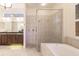 Spa-like bathroom featuring a large shower and garden tub at 22575 Morning Glory Cir, Bradenton, FL 34202