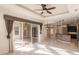 Spacious living room with tile floors and access to the pool area at 22575 Morning Glory Cir, Bradenton, FL 34202
