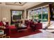 Virtually staged living room with pool view at 22575 Morning Glory Cir, Bradenton, FL 34202