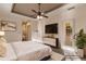 Virtually staged main bedroom with ensuite bathroom access at 22575 Morning Glory Cir, Bradenton, FL 34202