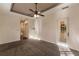 Main bedroom with carpeted floor and access to patio at 22575 Morning Glory Cir, Bradenton, FL 34202