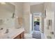 Neutral toned bathroom with a single vanity and walk-in shower at 2921 Seasons Blvd, Sarasota, FL 34240
