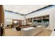 Open concept living area with modern kitchen and fireplace at 4014 Bay Shore Rd, Sarasota, FL 34234