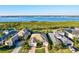 Stunning aerial view of a single-Gathering home with a tile roof and a beautiful waterfront backdrop at 5130 Tidewater Preserve Blvd, Bradenton, FL 34208