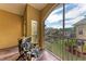 Screened balcony overlooking a garden and other buildings at 6315 Sunset Bay Cir, Apollo Beach, FL 33572