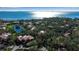 Aerial view of community, showcasing its location near the water and lush landscaping at 6466 Seagull Dr # 323, Bradenton, FL 34210