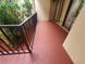 Small patio area adjacent to condo unit entrance at 6466 Seagull Dr # 323, Bradenton, FL 34210