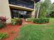 Ground level patio with access from condo and landscaping at 6466 Seagull Dr # 323, Bradenton, FL 34210