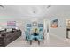 Bright living space boasts modern light fixture and open layout at 6741 Rookery Lake Dr, Bradenton, FL 34212