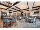 Spacious dining room with numerous tables and chairs at 6741 Rookery Lake Dr, Bradenton, FL 34212