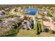 Aerial view of single-Gathering home with pool, near a lake at 22575 Morning Glory Cir, Bradenton, FL 34202