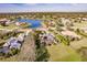 Aerial view of single-Gathering home with pool and lake view at 22575 Morning Glory Cir, Bradenton, FL 34202