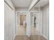 Elegant bathroom with double sinks, walk-in shower and large closet at 157 Tampa Ave # 707, Venice, FL 34285
